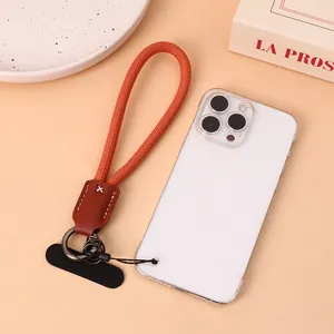 Orange nylon braided phone wrist strap with leather connector and anti-lost gasket