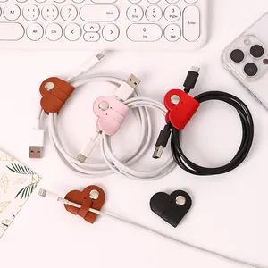Heart-shaped PU leather cable organizers with snap fasteners in multiple bright colors