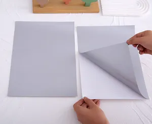 Detail of peeling A4 scratch-off silver coating sheet with self-adhesive backing