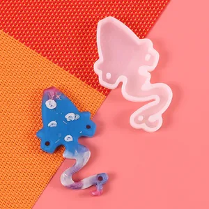 Detailed view of DIY resin silicone mold with a blue constellation pendant finish