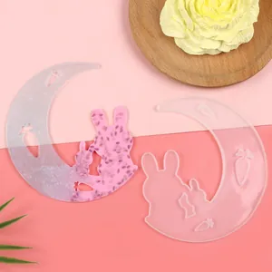 Detail view of crescent moon and rabbit silicone mold for resin jewelry DIY pendant