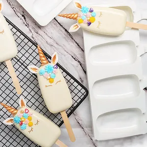 Detail view of white silicone ice cream mold with DIY unicorn popsicle creations