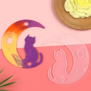 Silicone mold for moon cat resin pendant with finished colorful glittery epoxy sample