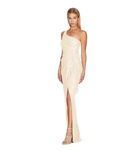 Full-length view of one-shoulder champagne sequined maxi dress with high slit