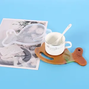 Irregular whale shaped silicone mold for creative DIY resin coasters with finished example