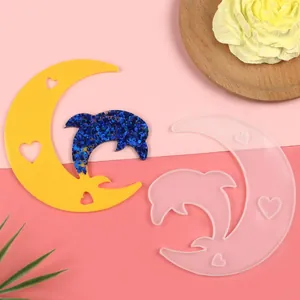 Close-up detail of high-quality silicone mold for moon and dolphin resin jewelry making