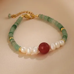 Detail of aventurine bead bracelet with red agate and freshwater pearls in New Chinese style