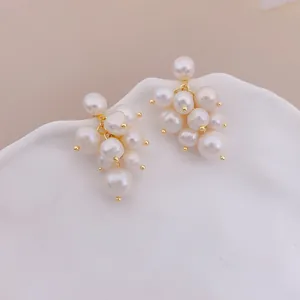 Elegant freshwater pearl grape cluster stud earrings with a gold-tone finish for women