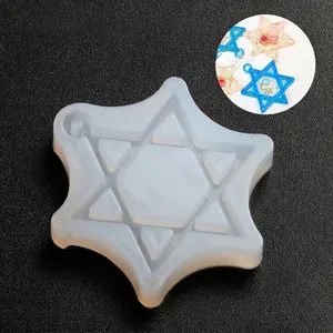 Detailed close-up view of a hexagram silicone resin mold with a functional hanging hole