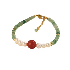 Elegant handmade green aventurine and freshwater pearl necklace with red agate bead