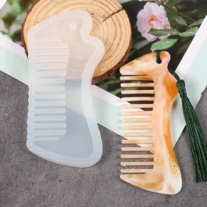 Detail view of a DIY silicone comb mold with its finished resin masterpiece.