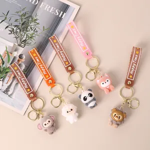 Set of five cute flocked animal doll keychains featuring monkey, panda, and fox designs