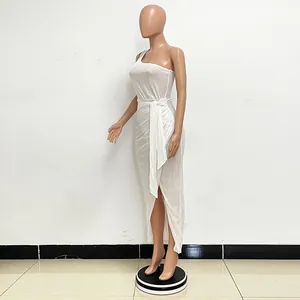Side view of white one-shoulder pleated sequin maxi dress on a display mannequin