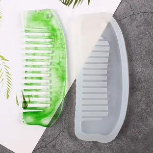 Macro detail view of a DIY resin comb silicone mold with a green marbled sample.