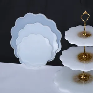 Detail view of 3-tier fruit tray silicone molds alongside finished resin cupcake stand