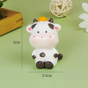 Detailed view of the cute cartoon cow resin figurine with 5cm height dimensions
