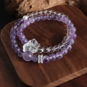 Bracelet double rang en améthyste et cristal blanc avec perle et breloque papillon