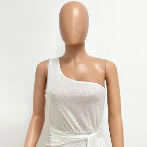 Close-up detail showing the white one-shoulder sequin maxi dress with elegant pleated waist tie