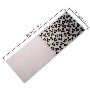 Detail of DIY plastic embossing folder with cherry pattern showing dimensions 29.5x10.5cm.