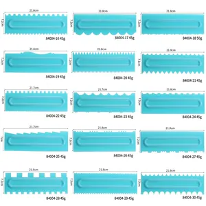 Macro view of 15 plastic cake scrapers with different serrated edge patterns for baking