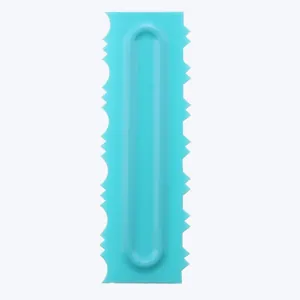 Detail of a blue plastic cake cream scraper with multiple decorative serrated edges