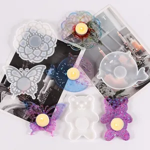 Detailed view of irregular silicone coaster molds and glittery resin finished products
