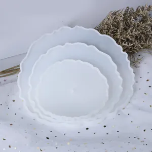 Macro detail view of three-layer scalloped edge silicone molds for DIY crystal resin trays