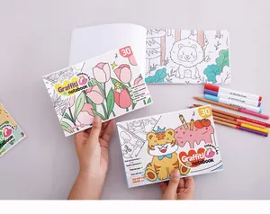 Detailed view of children's cartoon coloring books featuring cute animal and flower designs