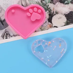 Heart-shaped silicone mold with paw print design for resin pendants and DIY keychains