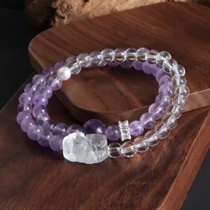 Bracelet double tour en améthyste et cristal blanc avec breloque lion de danse et perle