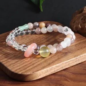Close-up of double-loop crystal bracelet with amethyst, citrine and rose quartz beads