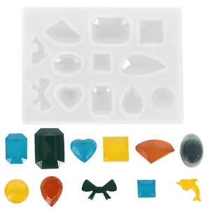 Vista dettagliata dello stampo in silicone per gemme con esempi in resina colorata.
