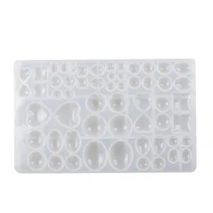 Translucent silicone mold featuring various geometric shapes for DIY jewelry making