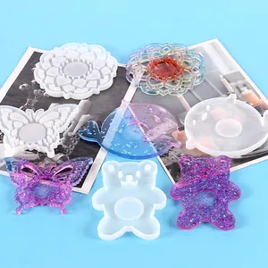 Set of DIY silicone molds for resin coasters in butterfly, bear and whale shapes