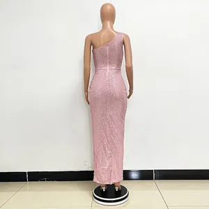 Detail view of the back of a pink sequined one-shoulder formal evening maxi gown.