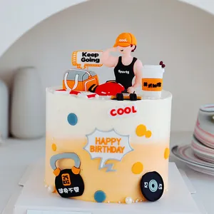 Creative fitness themed cake topper set with muscle man and gym gear for birthday