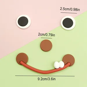 Décoration de gâteau visage souriant en colle souple avec dimensions de taille affichées