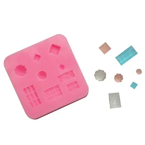 Detailed pink silicone mold for chocolate and candy with various geometric shapes