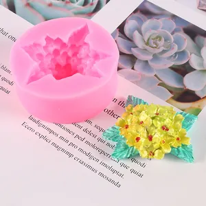 Close-up of pink hydrangea silicone mold with finished floral aromatherapy plaster tag