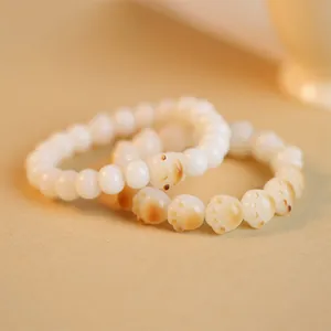 Natural white Bodhi root bracelet with toasted cat paw shaped beads for women