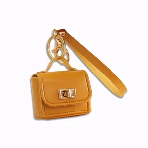 Gelber PU-Leder Mini-Taschen-Schlüsselanhänger mit Goldverschluss und praktischer Schlaufe