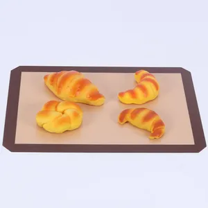 Premium heat resistant non-stick silicone fiberglass baking mat shown with bread