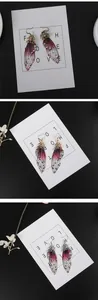 Exquisite Details handgefertigter Schmetterlingsflügel-Ohrringe mit lila Verlauf und Strasssteinen