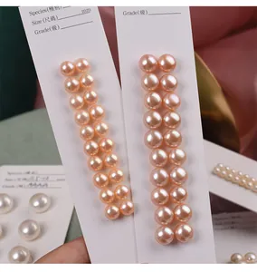 Gros plan de perles d'eau douce naturelles roses et blanches pour la création de bijoux DIY