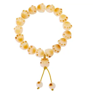 Handcrafted cat paw Bodhi root bracelet with cute kitten charm and decorative tassel