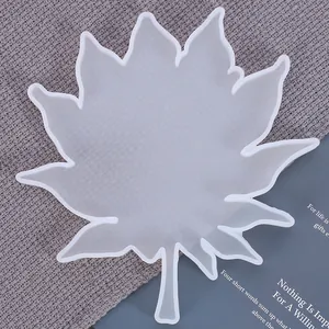 Close-up of translucent maple leaf shaped silicone mold for DIY epoxy resin craft projects