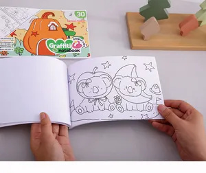 Close-up of children's graffiti coloring book with 30 pages of cute koala drawings.