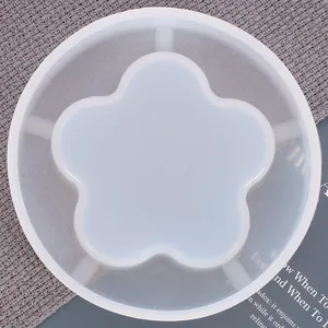 Top view of a translucent flower-shaped silicone mold for DIY resin crafts