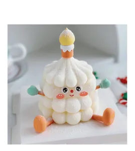 Macro view of a cute cartoon candle character cake decoration made of soft glue material