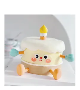 Close-up detail of a cute cartoon smiling cake figurine for kids' baking parties.